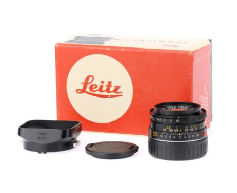 A Leitz Summicron-M f/2 35mm Lens, 11310, black, serial no. 3396985, body, G, elements, VG, one tiny light fungal patch to th