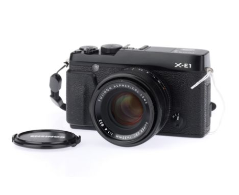 A Fujifilm X-E1 APS-C Mirrorless Digital Camera black, serial no. 31N51400, with a Fujinon Aspherical Super EBC f/1.4 35mm le