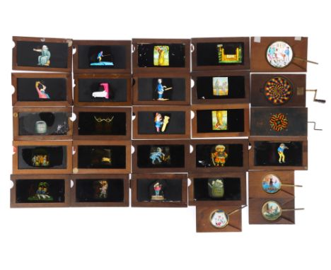 Good Collection of Victorian Magic Lantern Slides, Comprising of 21 hand painted mahogany cramed slip-slides, 2 mechanical ch