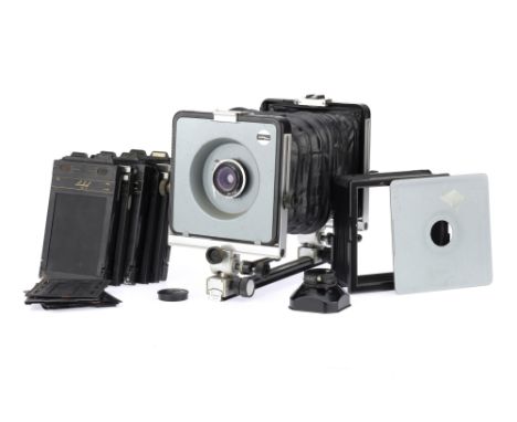 An Arca Swiss Monorail Large Format 4x5 Camera Outfit, black, body G, some wear to bellows, together with another set of bell