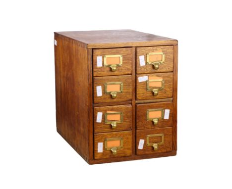 A Large Oak Cabinet of Magic Lantern Slides, The cabinet, constructed of polished oak with 8 pull out drawers, re-purposed fr