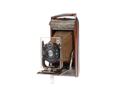 A No.12 Ensign Watch Pocket Carbine Tropical Model Folding Camera, body G-VG, some patina from age, bellows VG, with two smal