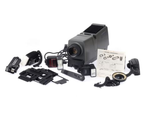 A Cabin Procabin 67-Z Medium Format Projector with a Cabin f/3.5 150mm lens and three sizes of slide carriers, together with 