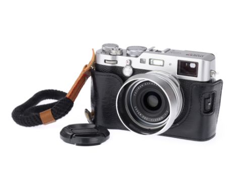 A Fujifilm X100F APS-C Compact Digital Camera chrome, with a Fujinon Aspherical Super EBC f/2 23mm lens, body VG, lens VG, wi