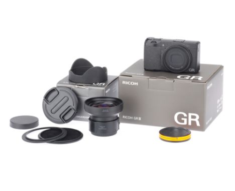 A Ricoh GR III Compact Digital Camera and GW-4 Wide Lens black, serial no. 0073523, with a GR f/2.8 18.3mm lens, Ricoh DB110 