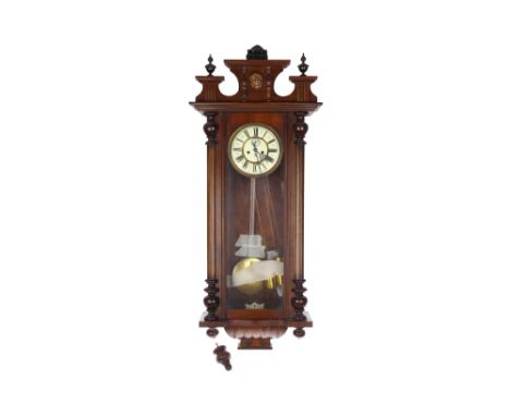 A 19th century oak cased Vienna style wall clock with twin train weight driven movement by Gustav German, dial marked GB ( Gu