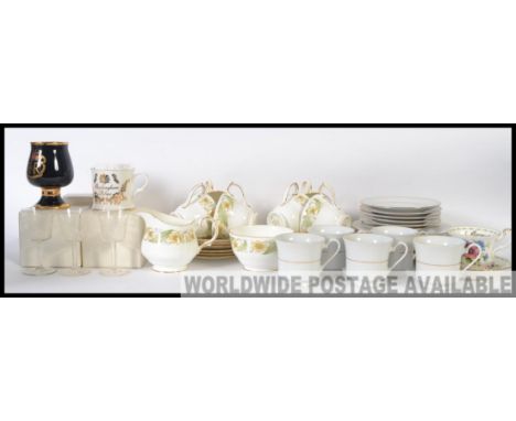 A Duchess part tea service along with three boxed Buckingham Palace cups
