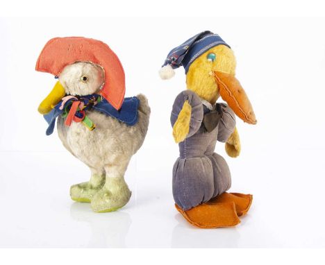 Two 1930s British comic ducks, a  Chad Valley with white artificial silk plush, clear and black glass eyes, yellow felt beak,