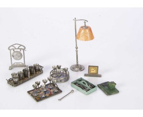 German 1930s metal dolls’ house chattels,  a standard lamp with hanging celluloid lampshade —4 1/2in. (11.5cm.) high, three t