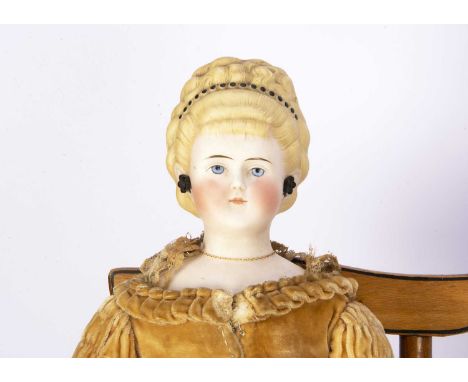 An Alt Beck & Gottschalck bisque shoulder head lady doll,  with blue painted eyes, blonde painted and moulded hair piled on t