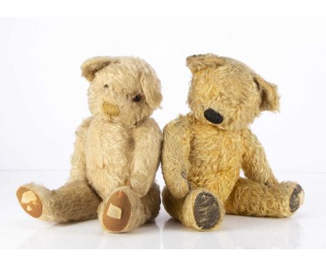 Two post-war Chad Valley Teddy Bears, a golden mohair bear, missing eyes, black stitched nose and mouth, swivel head, jointed