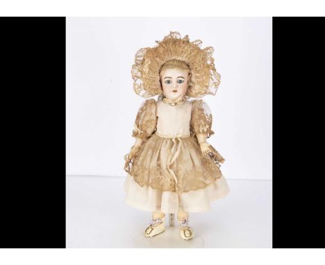 A Heinrich Handwerck 109 child doll,  with blue sleeping eyes, pierced ears, blonde mohair wig, jointed composition body, pin