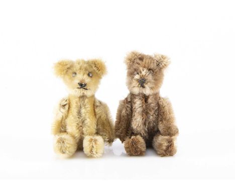 Two post-war miniature Schuco Teddy Bears, comprising a light brown mohair with metal pin eyes, black stitched nose and mouth