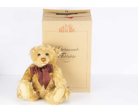 A Steiff Year 2000 Teddy Bear Blond 43, 7952 for the year 1999, in original box with certificate