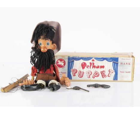 A rare Pelham Puppet Hank the Cowboy, in original box stamped Hank —14in. (35.5cm.) high (slight damage to box)