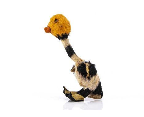 A rare British Belisha beacon road safety mohair duck circa 1934, with orange mohair round head, black and white striped moha