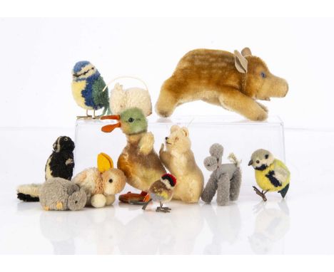 A selection of Steiff post-war animals, including a young wild boar, duck, two rabbits, pom-pom - a skunk, three  birds and t