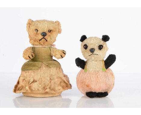 Two post-war Chiltern Roly-Poly Teddy Bears, including an unusual bear with orange and black plastic eyes, black plastic nose
