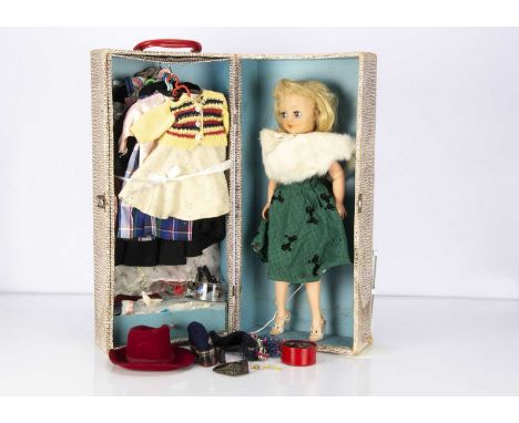 A Horsman vinyl fashion dolls Cindy late 1950s, with sleeping eyes, closed mouth and jointed body, in original wardrobe trunk