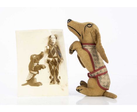 A Dean’s Rag Book Co Dickie Dack dachshund circa 1930, of light brown printed brushed cotton, sad features, metal nose, long 