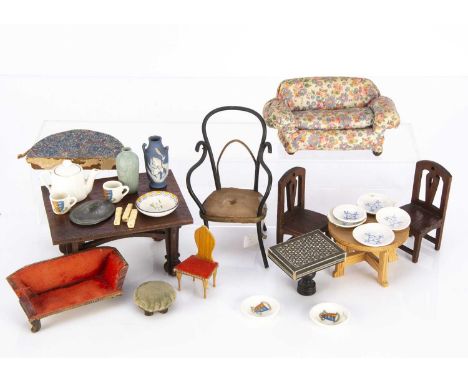 A Westacre dolls’ house sofa,  upholstered in floral print —5 1/2in. (14cm.) wide; a small scale German 19th century sofa and