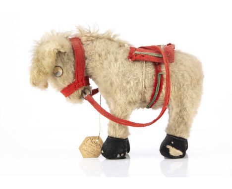 A Chad Valley Mabel Lucie Attwell’s Mokey the donkey 1930s, with light grey mohair, celluloid eyes with floating pupil, wool 