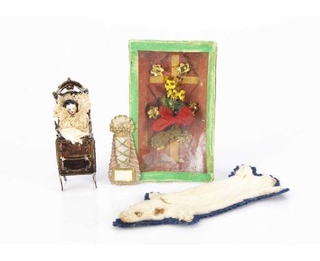 19th century dolls’ house chattels, a soft metal highchair commode with opening back, painted brown and china frozen Charlott