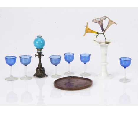 Dolls’ house glass and chattels,  six blue glass wine glasses with clear stems on turned wooden tray, a German cast metal oil