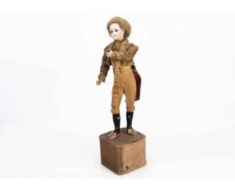 A Leopold Lambert 18th century man automaton,  with Jumeau bebe bisque head, fixed brown glass eyes, closed mouth, blonde hai
