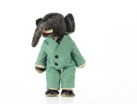 A rare Alpha Farnell Babar the Elephant 1930s, with dark grey mohair head and hands, clear and black glass eyes with brown pa