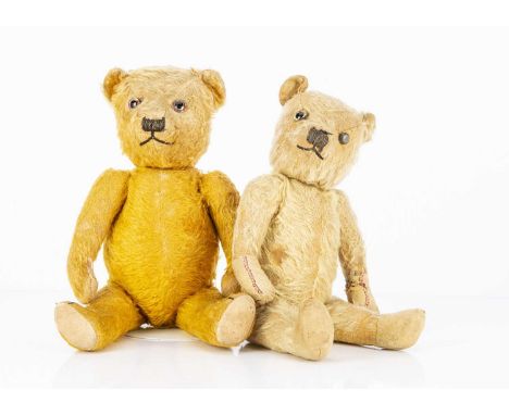 A 1930's Chiltern type Teddy Bear,  with blonde mohair, clear and black glass eye with remains of painted back (missing an ey