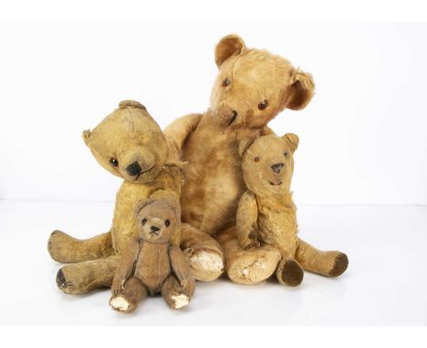 Four post-war British Teddy Bears,  A Chiltern Hugmee teddy bear —15in. (38cm.) high (head off, missing eye and wear); a smal