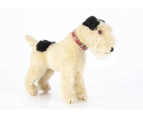 A post-war Steiff Foxy standing Fox Terrier, with white mohair and black patches, brown and black glass eyes, black stitched 
