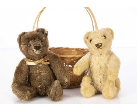 Two small post-war Steiff Teddy Bears,  a brown mohair bear with brown and black glass eyes, black stitched nose and mouth, s