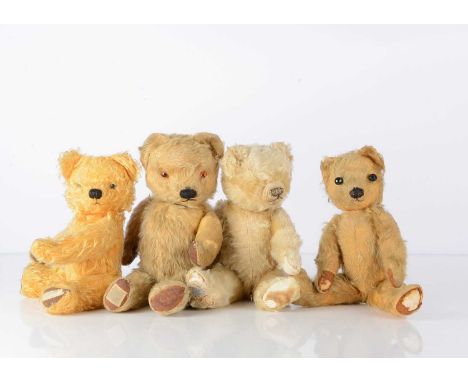 Four post-war Chad Valley Teddy Bears, including a golden mohair, with orange and black glass eyes, black stitched nose and m