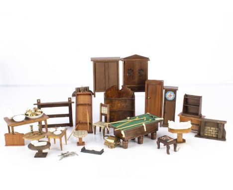 A quantity of wooden dolls’ house furniture,  three wardrobes, a chest of drawers, a long case clock —4 3/4in. (12cm.) high, 