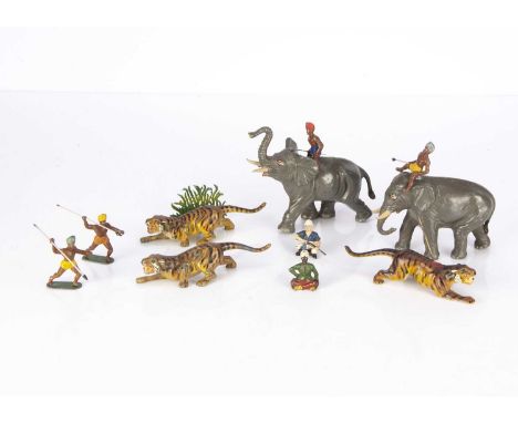 Parts from the Timpo hollow-cast lead Tiger Hunt circa 1950, elephants with raised trunk and walking with lowered trunk —5in.