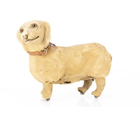 A rare Roullet &amp; Decamps clockwork Dachshund automaton circa 1900, the carton body covered in beige kid leather, clear an