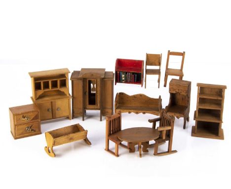 1910-1930s dolls house furniture,  a Tiny Toys red painted book case with books —3in. (7.5cm.) high; Castle Pollard chair and