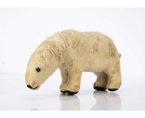 A British polar bear with tail operated rotating head,  probably Omega 1930s, white wool plush, black boot button eyes, black