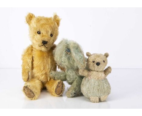 A post-war Chiltern Hugmee Teddy Bear,  with golden mohair, orange and black glass eyes, black stitched nose, mouth and claws