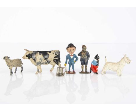 Britains hollow-cast lead advertising figures, hand-painted comprising Nestle’s Map of the World Cow —3in. (7.5cm.) long, Sha