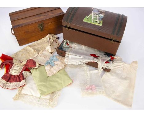 An early 20th century  domed dolls’ cabin trunk, of brown oil-cloth, blue cloth interior, drawer pulled out from front and so