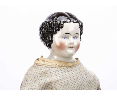 A 19th century Alt Beck &amp; Gottschalck china shoulder head doll, with blue upward glancing eyes with white dot highlight, 