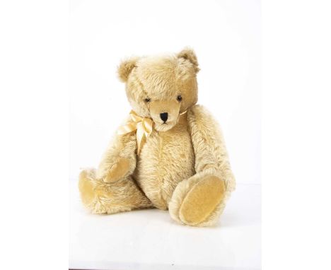 A post-war Hamiro Teddy Bear,  with light golden mohair, clear and black glass eyes with brown painted backs, pronounced shor