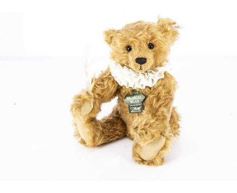 A Steiff limited edition Harrods musical Poet Teddy Bear, 702 of 2000, in original box with certificate and outer packing car