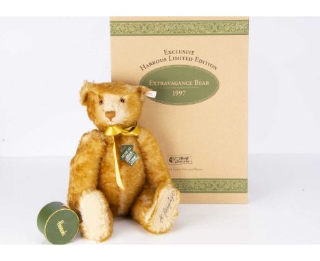 A Steiff limited edition Harrods Musical Extravagance Teddy Bear, 67 of 2000, plays Shirley Bassey's "Big Spender", holding a