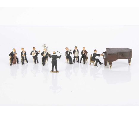 A Charbens hollow-cast lead Jack’s Band, comprising a grand piano —3 1/4in. (8.5cm.) long, eight musicians and a conductor wi