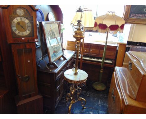 A brass and onyx standard lamp/ occasional table