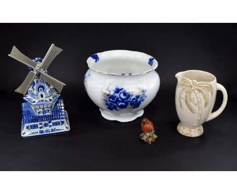 Collection of Various Ceramics including Delft Ceramic Windmill 11 inches high 2. Beswick 1930's jug 7.25 inches tall 3. Felt